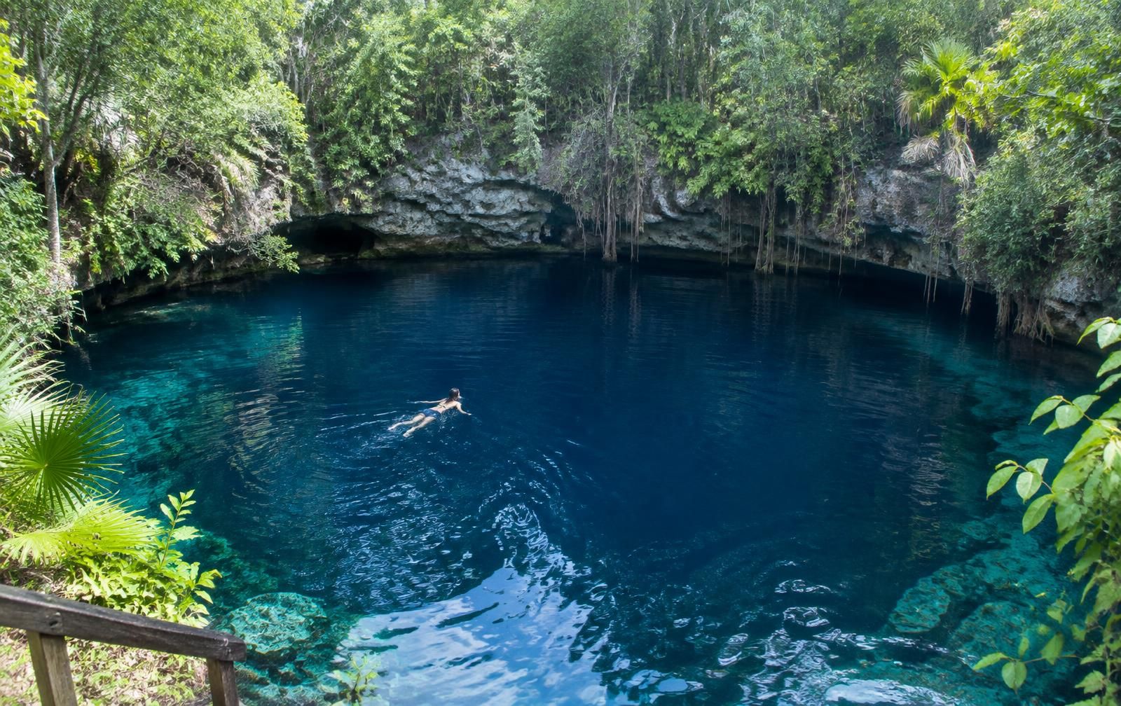 Cenote Azul · a deep blue cenote beside the lagoon